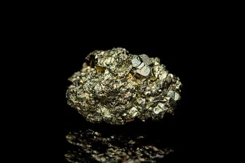 Pyrite gemstone on dark background Stock Photos