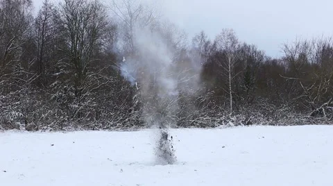 Pyrotechnic explosion in open countryside in winter Stock Footage 61405543