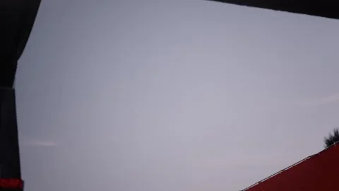 Pyrotechnic Flame Burst Against Blue Sky in Slow Motion Stock Footage 341592732