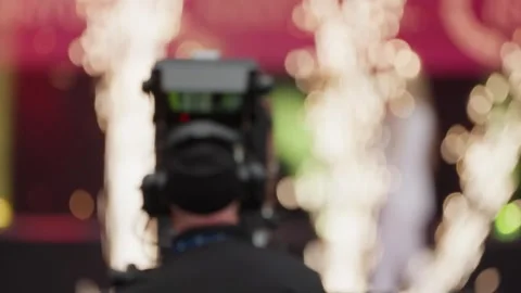 Pyrotechnics fire on stage during the Charlie Kirk memorial service Stock Footage 345298516