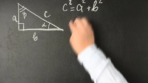 Pythagorean theorem. We write with chalk on a board. The accelerated video. Stock Footage 79731434