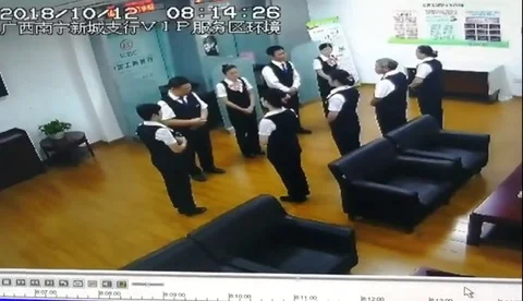 Python drops from ceiling onto staff in China bank 스톡 동영상 106316130