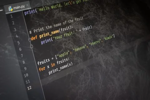 Python Hello World code on screen Stock Photos