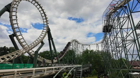 Python rollercoaster going through a loop in the Efteling amusement park in the Video stock 337745019