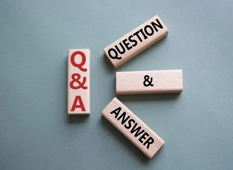 Q and A - Question and Answer. Wooden cubes with words Q and A. Beautiful g.. Stock Photos