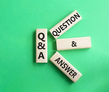 Q and A - Question and Answer. Wooden cubes with words Q and A. Beautiful g.. Stock Photos