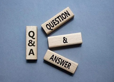 Q and A - Question and Answer. Wooden cubes with words Q and A. Beautiful gre Stock Photos