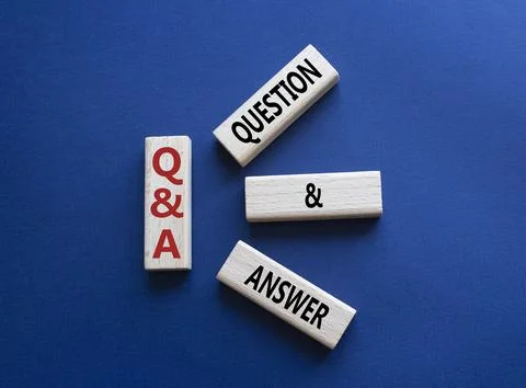 Q and A - Question and Answer. Wooden cubes with words Q and A. Beautiful d.. Stock Photos