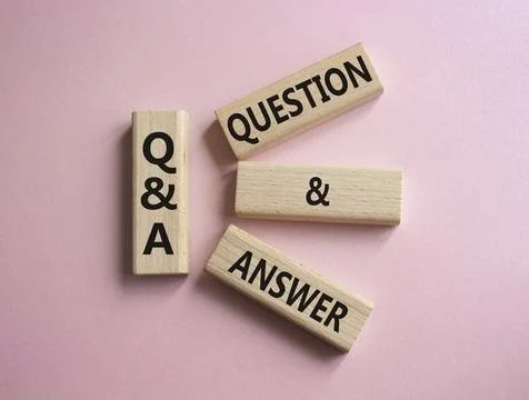 Q and A - Question and Answer. Wooden cubes with words Q and A. Beautiful p.. Stock Photos