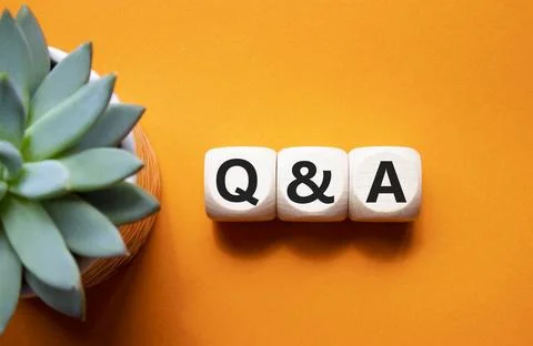 Q and A - Question and Answer. Wooden cubes with words Q and A. Beautiful o.. Stock Photos