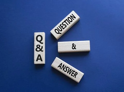 Q and A - Question and Answer. Wooden cubes with words Q and A. Beautiful d.. Stock Photos