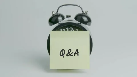 Q&amp;A or Question and Answer Text or Word on Yellow Note Paper Sticking Clock Video stock 299942983