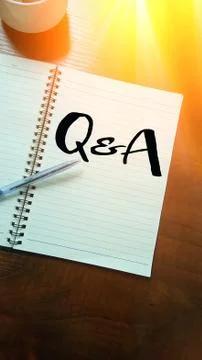 Q&amp;a text on white document Stock Photos