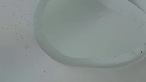 Q-Tip Stirs Clear Gel Stock Footage 77779415