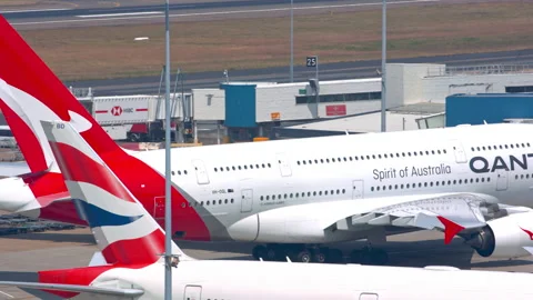 Qantas A380 Arriving to Terminal Gate at SYD Sydney International Airport Stock Footage 143822311