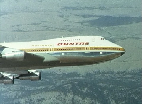 QANTAS AIRCRAFT FLYING / LANDING AT AIRPORT, AUSTRALIA (1980) Stock Footage 228708847