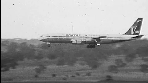 QANTAS AIRCRAFT LANDING AT MELBOURNE AIRPORT (1971) Stock Footage 168598201