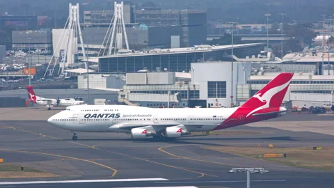 Qantas Boeing 747-400 Taxiing at SYD Sydney International Airport Stock Footage 143831999