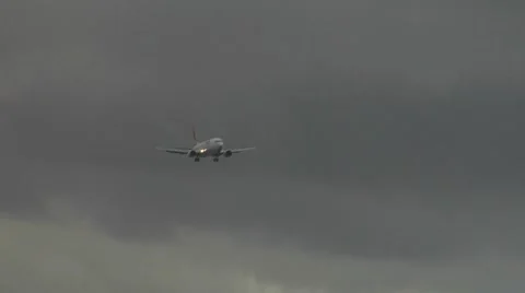 Qantas flight on blustery approach Stock Footage 8984056