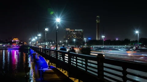 Qasr El Nil bridge over the Nile river in Cairo, Egypt. Night time lapse video. Stock Footage 124757645