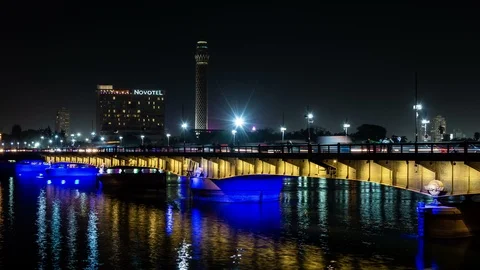 Qasr El Nil bridge over the Nile river in Cairo, Egypt. Car traffic at night. Stock Footage 124757721