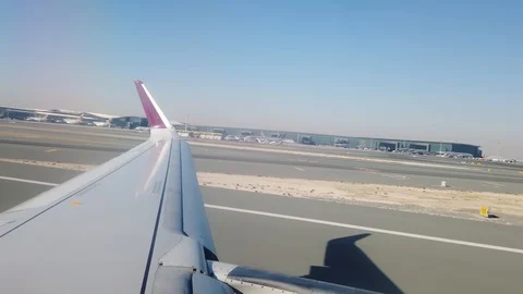 Qatar airliner taking off from Doha Hamad International Airport Stock Footage 129697344