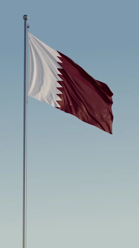 Qatar Doha Flag vertical Cinematic Loop Realistic Motion Blue Sky 스톡 동영상 277797141