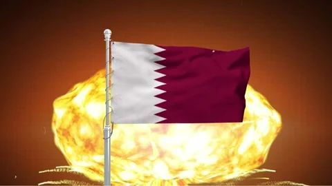 Qatar flag waving slowly in front of a giant bright nuclear explosion mushr.. Vídeos de archivo 341868797
