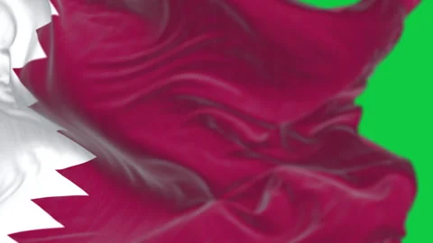 Qatar national flag waving in the wind isolated on green background Stock Footage 337168202
