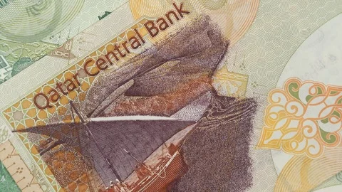 Qatar riyal notes slow rotating. Qatari currency, money Stock-Footage 105524659