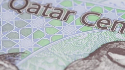 Qatar riyals macro slow rotating. Low angle Stock Footage 102227100