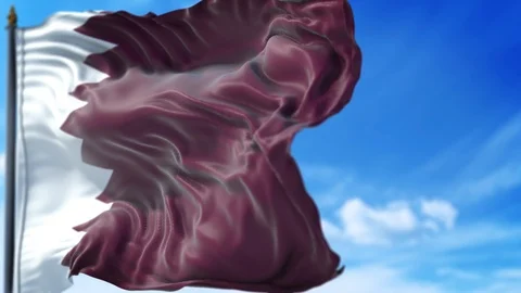 Qatari Flag is Waving Against Blue Sky Stock Footage 118028837