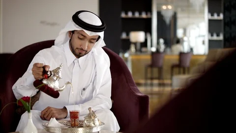 Qatari man drinking coffee. Stock Footage 119391806