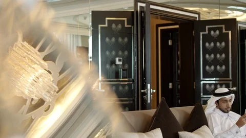 Qatari man messaging on mobile. Stock Footage 119508111