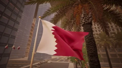 Qatari national flag waving with warm morning sunlight in modern city 库存影片 322995656
