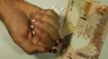 Qatari Riyal QAR, Counting Drugs and Money, Health Care, Colorful Pills HD Footage