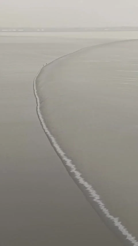 Qiantang River Tidal Bore Seen from Above in Zhejiang, China Stock Footage 337380823