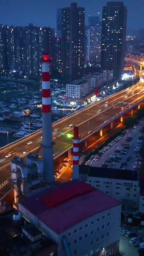 Qingdao City Night Lights: Elevated Highways and Bustling Metropolis Stock Footage 330722361