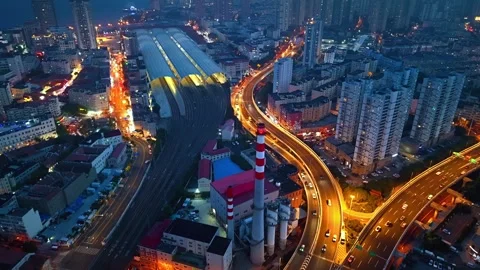 Qingdao City Nightscape: Elevated Roads and Railway Station Stock Footage 330722040