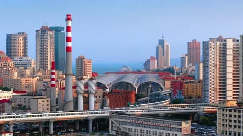 Qingdao City Skyline with Station, Elevated Road, and Industrial Chimney Stock Footage 330722778