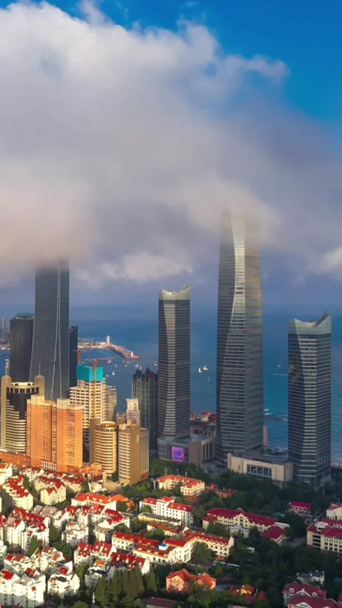 Qingdao City Time-Lapse: Clouds Drifting Over Modern Skyscrapers Stock Footage 330882408
