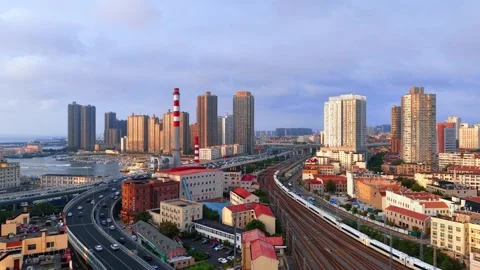 Qingdao Cityscape with Elevated Road and High-Speed Train Stock Footage 330722733