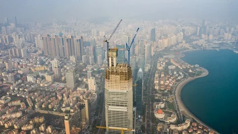 Qingdao downtown bay view construction aerial timelapse panorama 4k china Stock Footage 124686796