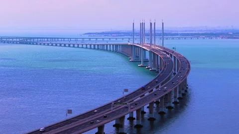 Qingdao Jiaozhou Bay Bridge: Modern Traffic Flow Over Blue Waters Stock Footage 330790053