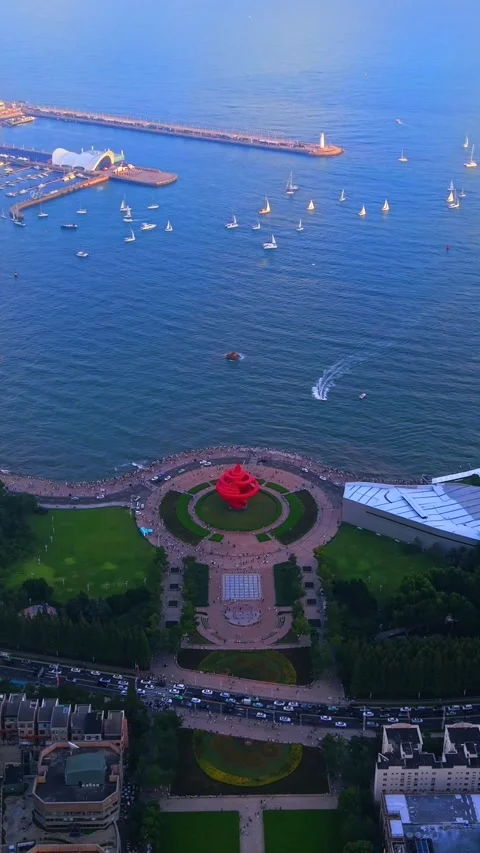 Qingdao May Fourth Square and Sailing Marina at Twilight Stock Footage 330708775