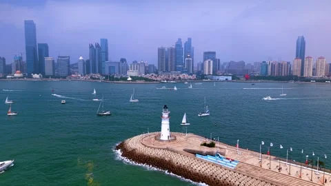 Qingdao Olympic Sailing Center Lighthouse and City Skyline Stock Footage 330848583