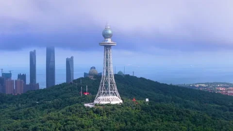 Qingdao TV Tower and Cityscape engulfed by clouds Stock Footage 330731253