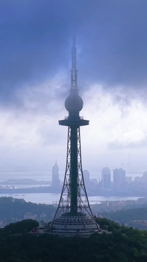 Qingdao TV Tower on Cloudy Day with Misty Cityscape Stock Footage 330733014