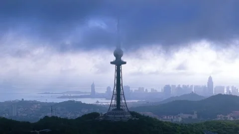 Qingdao TV Tower with Dramatic Clouds and Cityscape Video stock 330731314