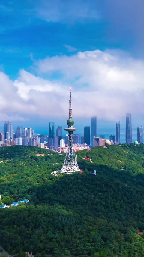 Qingdao TV Tower Time-lapse with Dynamic Clouds and City Skyline Stock Footage 330882425
